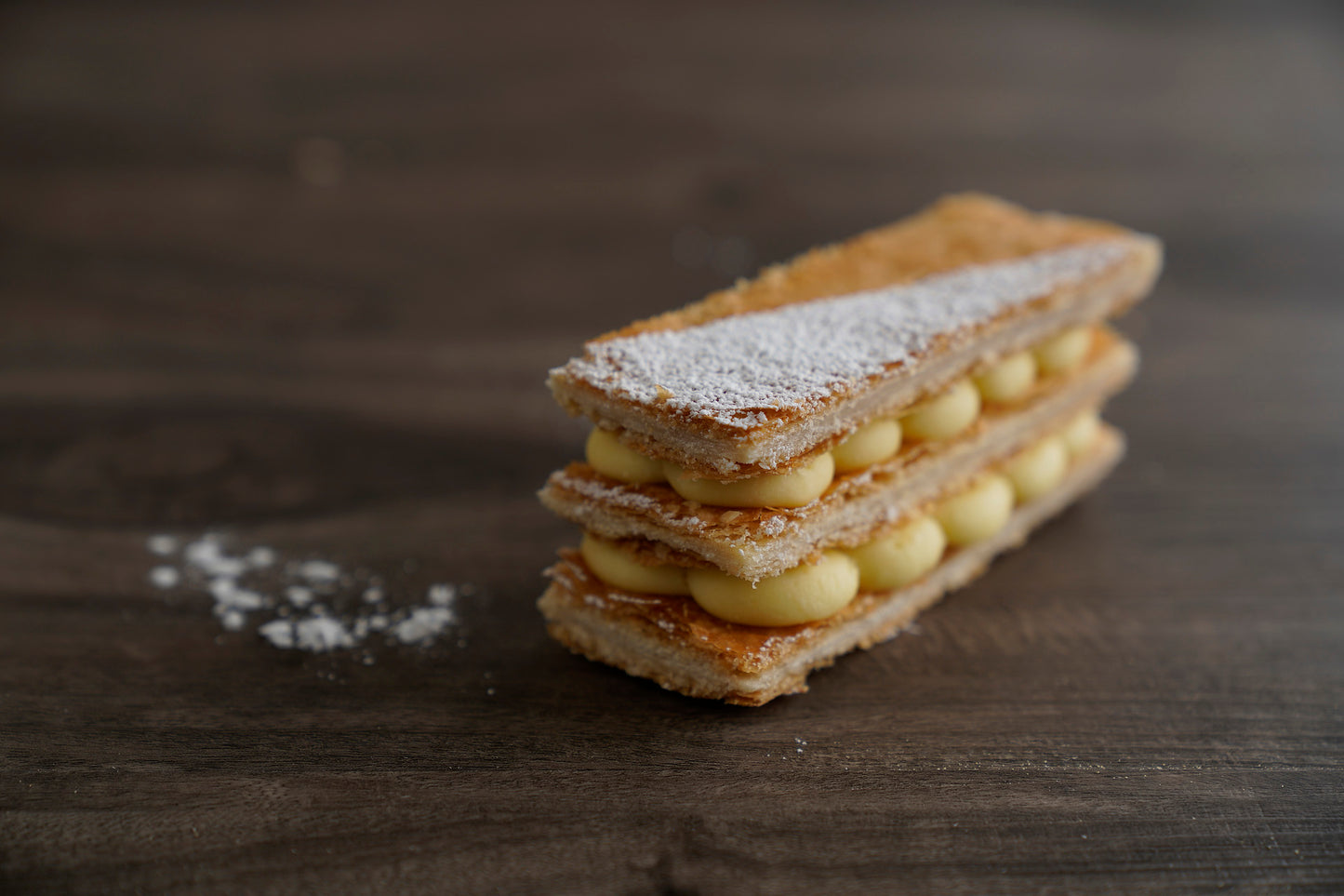 Thin layers of puff pastry filled with creamy vanilla mousseline